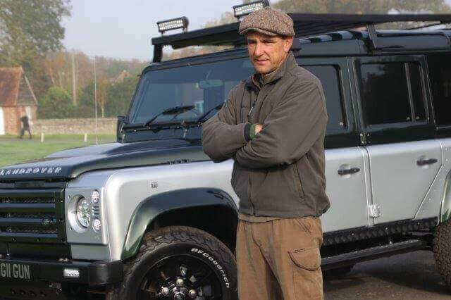Vinnie Jones Standing with Land Rover 2